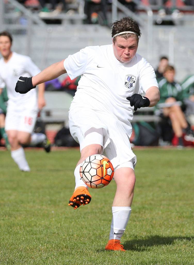 Hunter Downes controls the ball for the Wolves Saturday. (Photo by John Fisken)