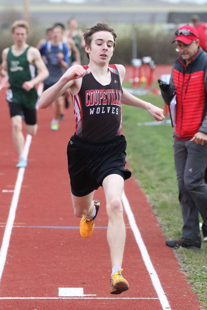 Danny Conlisk crosses the finish line in the 800 meters.(Photo by John Fisken)