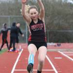 Zoe Trujillo soars in the long jump.(Photo by John Fisken)