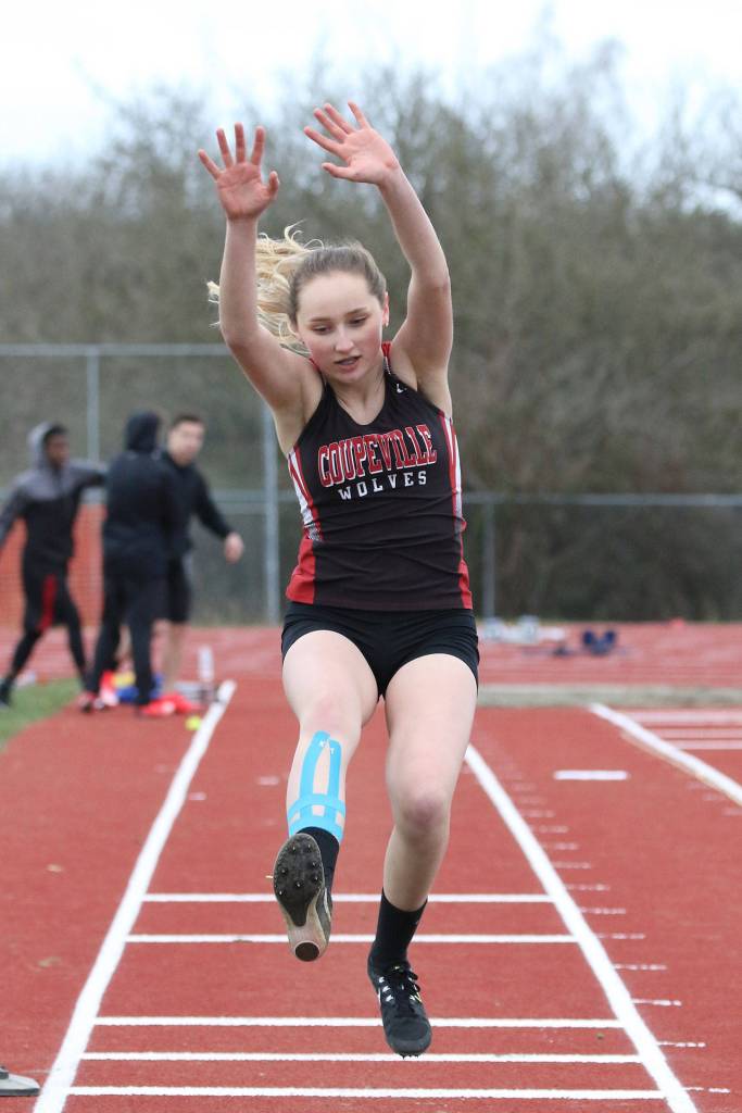 Zoe Trujillo soars in the long jump.(Photo by John Fisken)