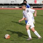 Alex Jimenez looks for an open teammate in Fridays win. (Photo by John Fisken)