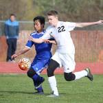 Coupevilles Ben Smith, right, battles a Chimacum player for possession in Fridays match.(Photo by John Fisken)