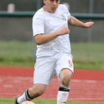 Axel Partida advances the ball for the Wolves in the Vashon Island match in Coupeville Monday. (Photo by John Fisken)