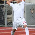 The Wolves Derek Leyva puts the ball in play.(Photo by John Fisken)