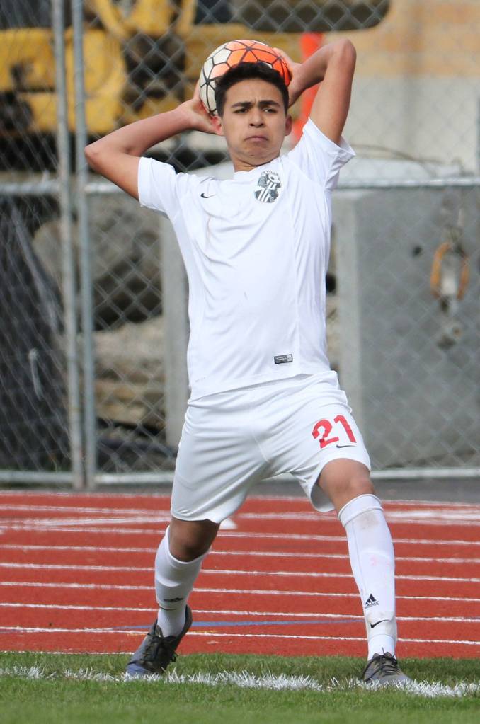 The Wolves Derek Leyva puts the ball in play.(Photo by John Fisken)