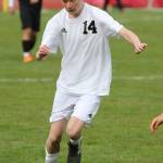 Laurence Boado give the ball a boot Monday.(Photo by John Fisken)