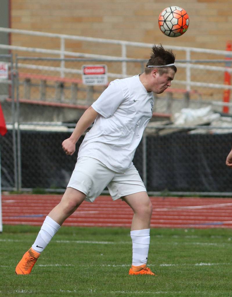 Hunter Downes uses his head during Mondays match.(Photo by John Fisken)