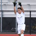 Kanoa King puts the ball in play for the Wildcats.(Photo by John Fisken)