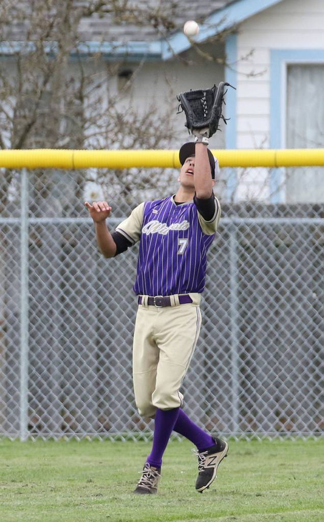 Caleb Fitzgerald looks in a flyball to left field Tuesday.(Photo by John Fisken)