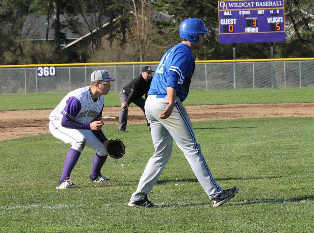 Wildcat third baseman Thomas Anderson is playing in to cut down Shorewoods Kevin Hirohata if he attempts to score on a ground ball.(Photo by Jim Waller/Whidbey News-Times)