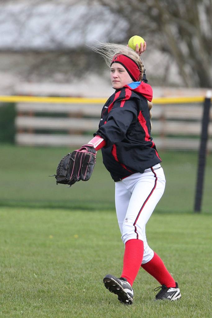 Coupeville outfielder Emma Mathusek tosses the ball to the cutoff man.(Photo by John Fisken)
