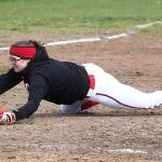 Shortstop Katrina McGranahan dives to catch a Forks pop-up.(Photo by John Fisken)