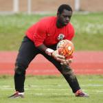 Coupeville keeper Dewitt Cole scoops up a Forks kick.(Photo by John Fisken)
