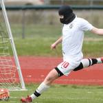 Wolves, Spartans play to wind-blown tie / Soccer