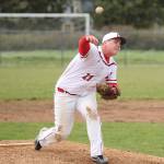 Julian Welling tosses a pitch for Coupeville Saturday. Welling was the winning pitcher in part to his own game-winning hit.(Photo by John Fisken)