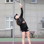 Coupevilles Sage Renninger serves during the first doubles match with North Kitsap.(Photo by John Fisken)