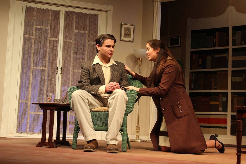 Is it an unconventional marriage proposal? Or perhaps something else causes Midge Harvey (Trinity Slowik) to kneel beside Edward Angkatell (Warren Rogers) near the end of the play, The Hollow, at Whidbey Playhouse April 13-29.