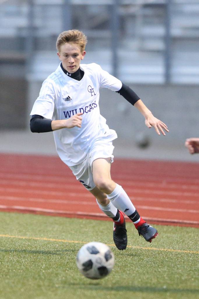 Nathan Merrill goes on the attack for Oak Harbor.(Photo by John Fisken)