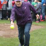 Oak Harbor Mayor Bob Severns opens the softball season with the first pitch.(Photo by John Fisken)