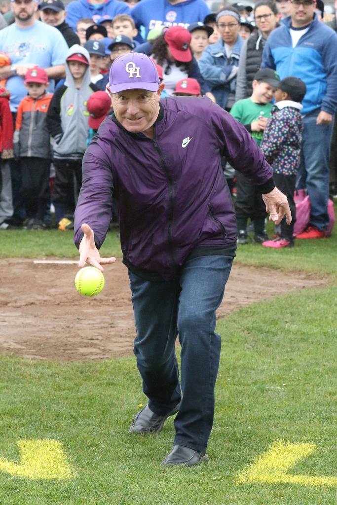 Oak Harbor Mayor Bob Severns opens the softball season with the first pitch.(Photo by John Fisken)