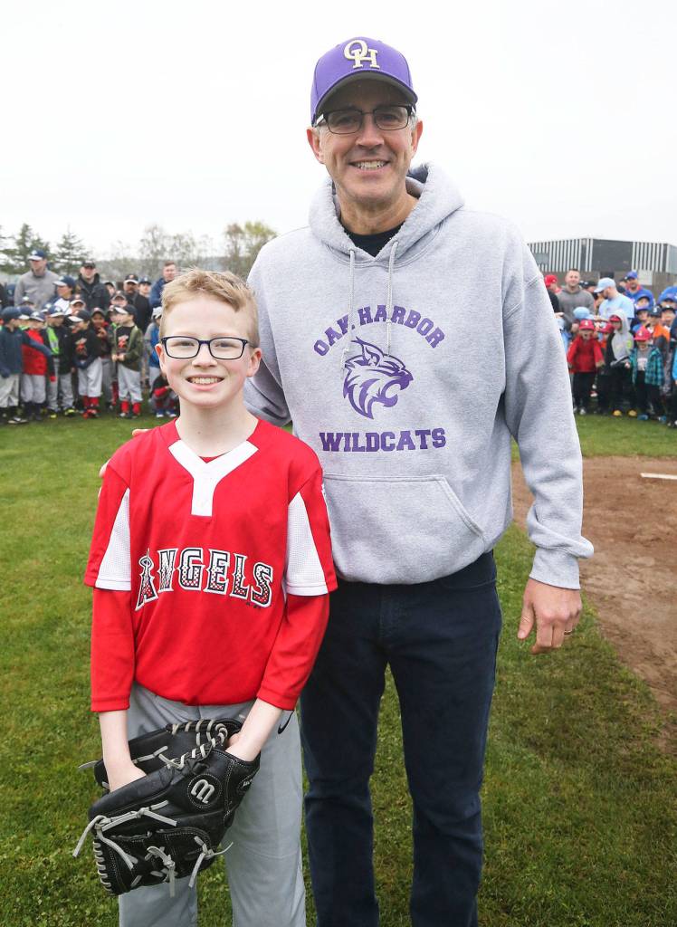 Oak Harbor School District Assistant Superintendent Steve King with the Angles Aidyn McDermott. (Photo by John Fisken)