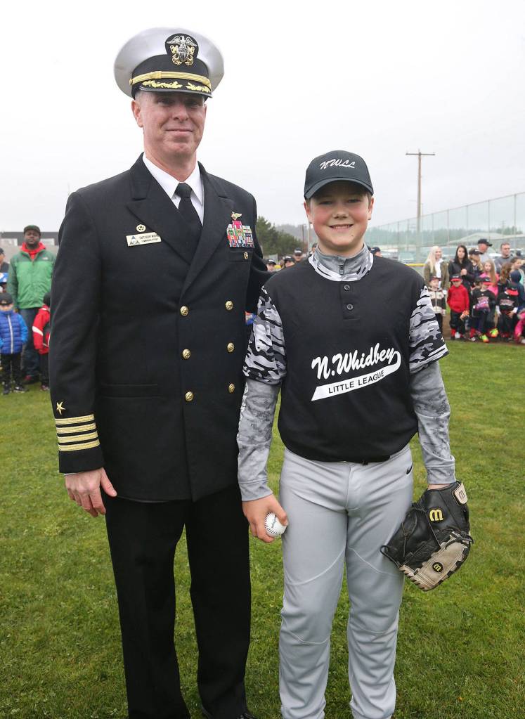 Captain Geoff Moore and North Whidbey Little Leagues Travis Westman.(Photo by John Fisken)