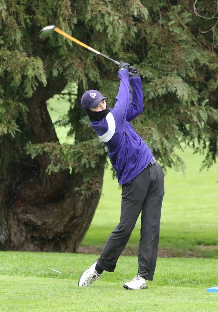 Nate Thompson fires one down the fairway Monday afternoon.(Photo by John Fisken)