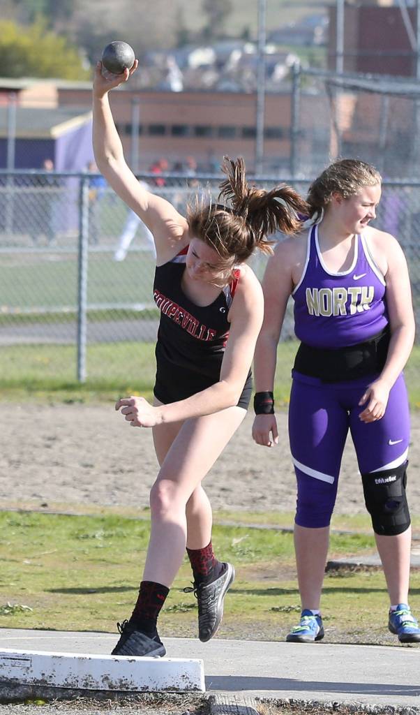 Emma Smith tosses the shot put in Wednesdays meet.(Photo by John Fisken)