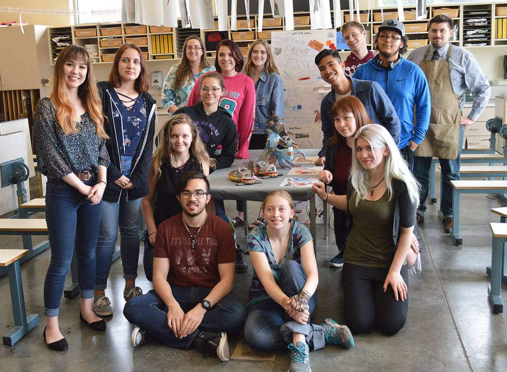 Art students at Oak Harbor High School volunteered to compete in the Vans Custom Culture Contest for a chance to win $75,000 for the schools art program. Students who particiapted are: Rheanna Benson, Edison Soliman, Megan Hauter, Samantha Spencer, Cydney Szypula, Allison Jungmann, Dominic Jeannet, Cameron See, Momoko Johnston, TJ Deitrick, Kaitlyn OClair, Nathanael Miller, Caroline Jungmann, Not pictured: JoseCarlos Martinez Castro, Adrianne Gribble, Griffin Stein, Kelly Gruenwald. Photo by Laura Guido/Whidbey News Group