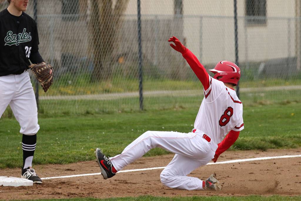 Jake Hoagland hustles to third on a wild pitch.(Photo by John Fisken)