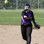 Brooke Gilham tosses to first for an out.(Photo by John Fisken)