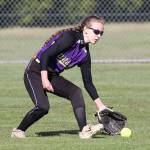 Center fielder Miranda Wilson scoops up an Edmonds-Woodway base hit.(Photo by John Fisken)