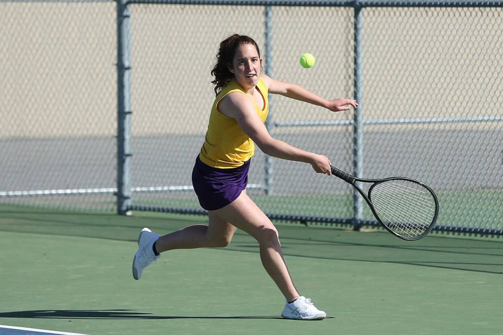 Annie Salinger chases down the ball in third doubles.(Photo by John Fisken)