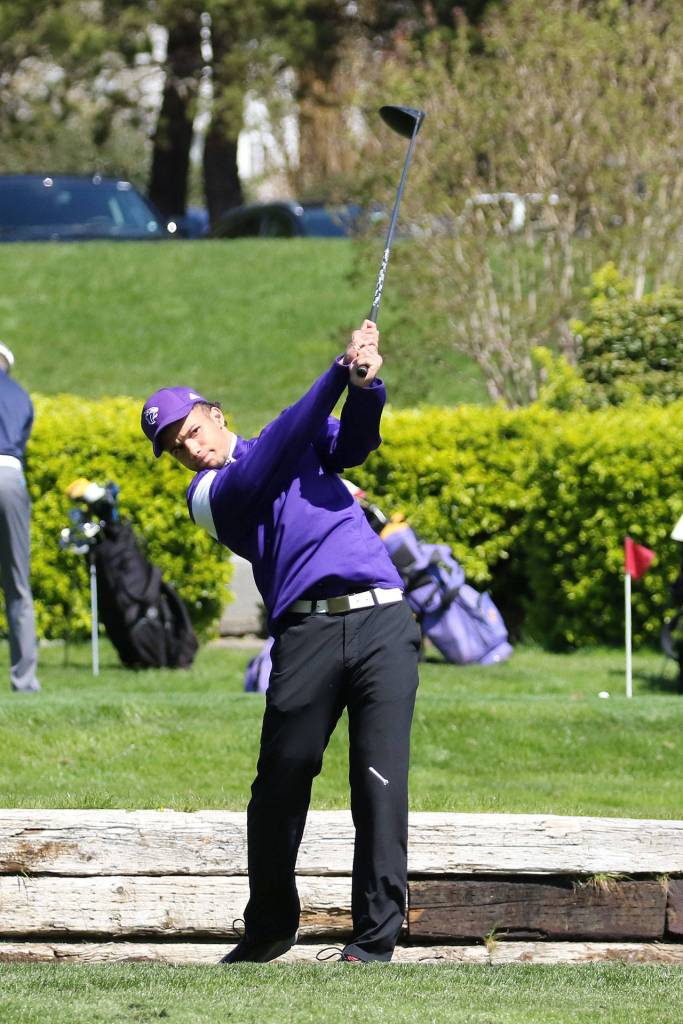 Haven Brown launches a tee shot for the Wildcats.(Photo by John Fisken)