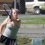 Coupevilles Avalon Renninger returns a shot in Wednesday s match with South Whidbey. (Photo by John Fisken)