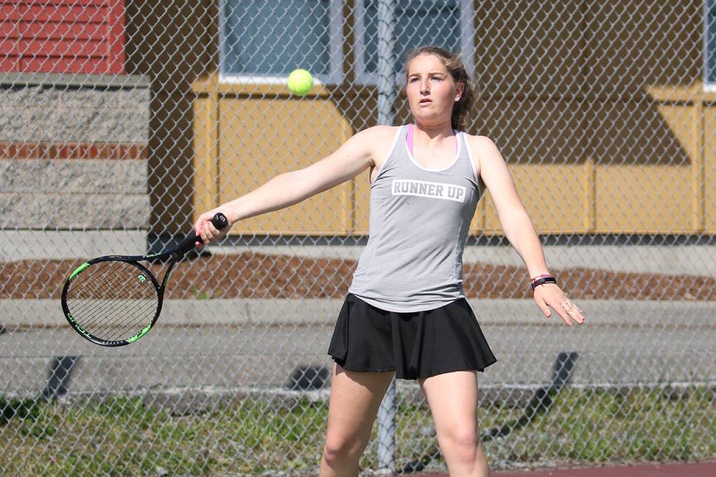 Tia Wurzrainer slaps a forehand in the South Whidbey match.(Photo by John Fisken)