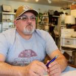 After 30 years of drinking and finally getting sober, former Marine Dennis Phillips of Freeland is helping others with addiction. While obtaining his associate degree in human services, Phillips works with the Island County Opioid Outreach Team. Photo by Patricia Guthrie/Whidbey News Group