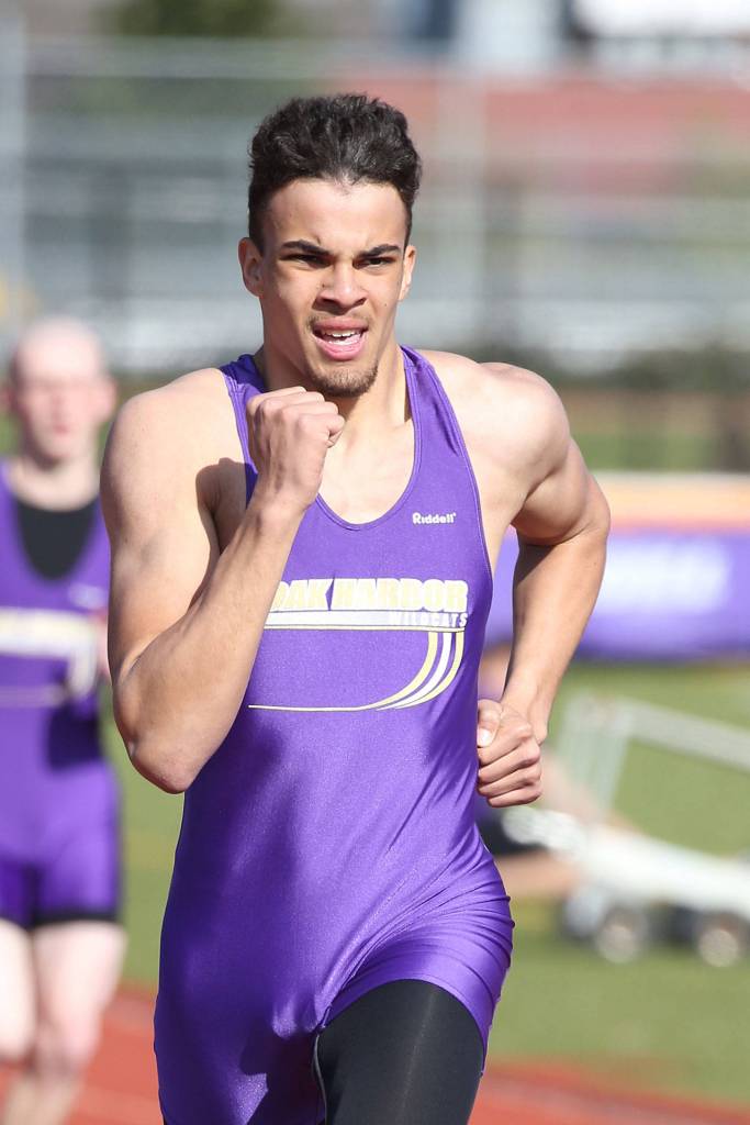 Ozell Jackson races to the finish line in his win in the 400.(Photo by John Fisken)