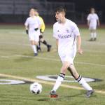 Diego Aranguri-Plummer punches the ball ahead for the Wildcats. (Photo by John Fisken)