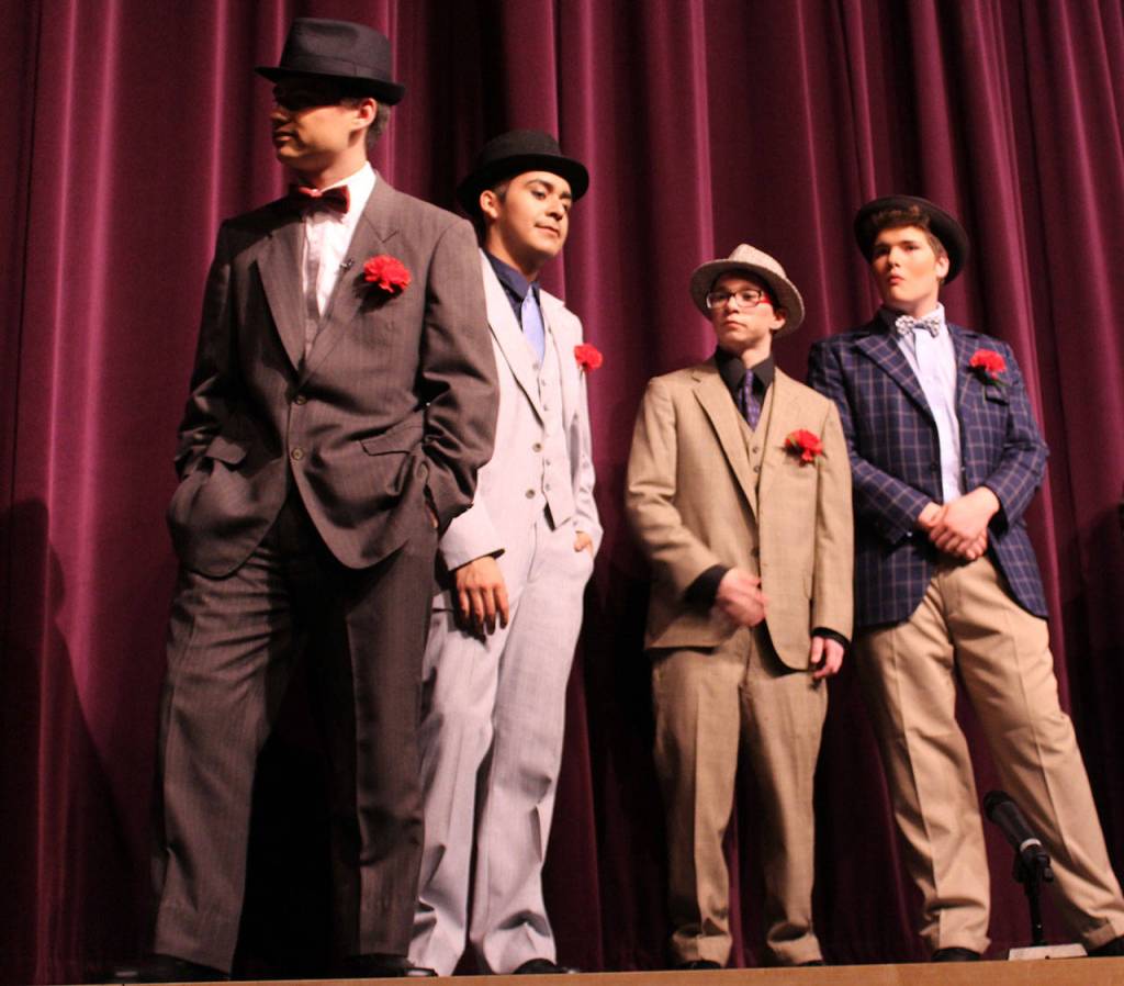 Lots of shooting craps, illegal betting and gangsta talk goes down during Oak Harbor High Schools presentation of Guys & Dolls. Left to right are Braedon McMahan as Vinny Vincenzo,  Cristian Bautista as Lucky Lorenzo, Ashton Mendiola as Society Max and Daemyn Rock as Angie the Ox.