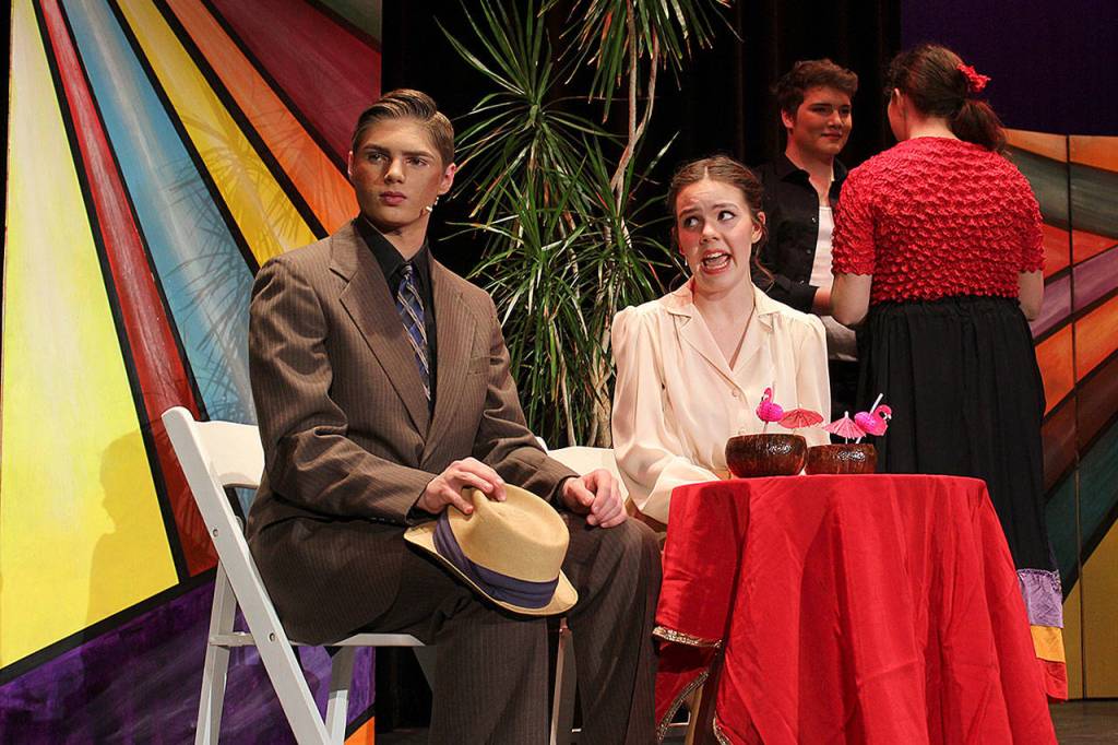 Carl Davis, playing notorious gambler Sky Masterson, whirls his unlikely date off to Cuba. Kaitlin Barrailler plays Save-a-Soul Mission gal Sarah Brown.