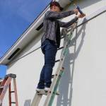 Coupeville High School senior Cameron Toomey-Stout helped weather-proof a house.