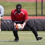 Keeper Dewitt Cole scoops up the ball for the Wolves.(Photo by John Fisken)
