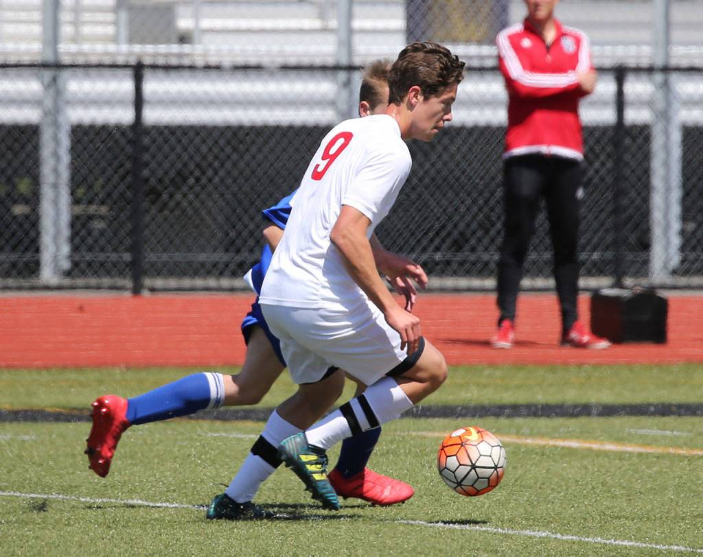 William Nelson goes on the attack for Coupeville.(Photo by John Fisken)