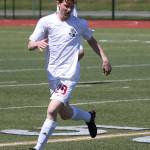 Coupevilles Sam Wynn runs down a loose ball.(Photo by John Fisken)