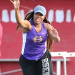 Jhayna Bowie tosses the shot put for Oak Harbor.(Photo by John Fisken)