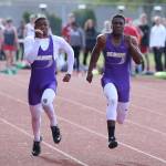 The Hardin brothers, Dorian, left, and Taeson, run the 100 meters at the Stanwood Twilight Invitational Friday.(Photo by John Fisken)