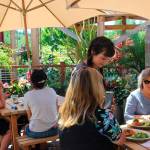 After being closed two months for renovation, Flower House Cafe in Bayview opened over the weekend.Server Mary Petosa provides lunch to two diners Monday. Photo by Patricia Guthrie/Whidbey New Group
