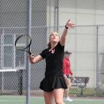 Tia Wurzrainer serves during the league tournament last week.(Photo by John Fisken)