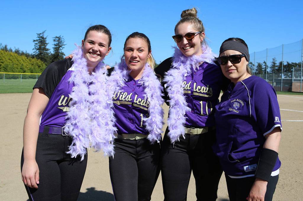 Seniors Lavinia Liatti, Samantha Payne and Rylee Joseph with coach Tashina Tosh.(Photo by John Fisken)